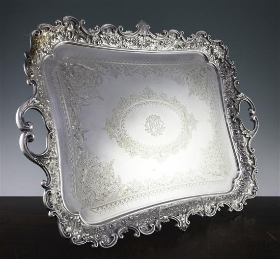 An Edwardian silver two handled presentation tea tray, 150 oz.